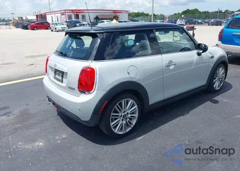 2014 Mini Cooper Cooper from USA, damaged, VIN WMWXM5C56ET933833